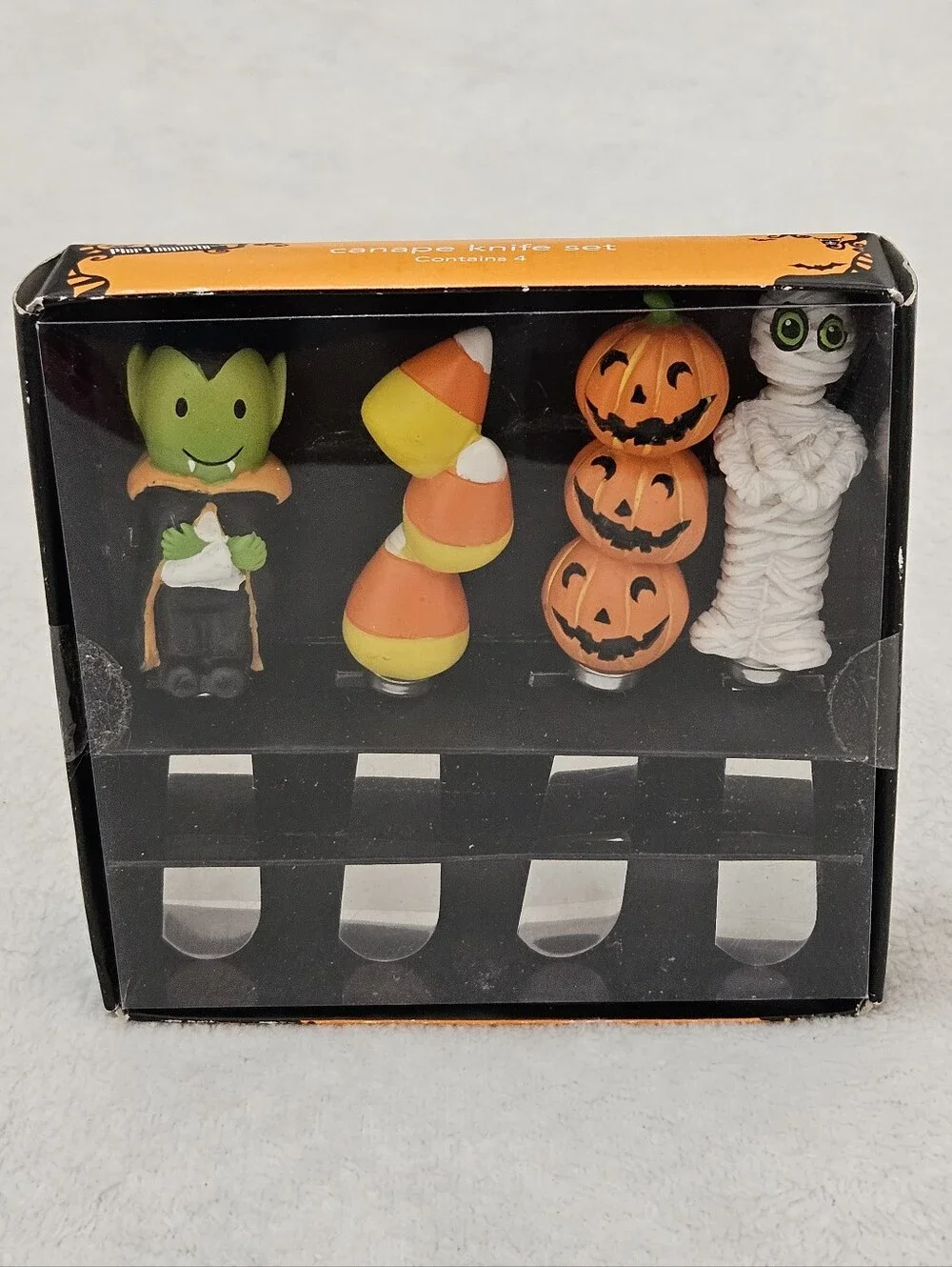 The Pier 1 Imports Halloween Canape Knife Set (4) featuring a spooky Halloween